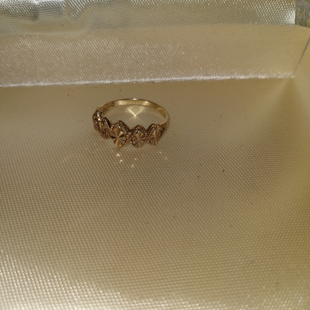 Little gold engagement ring